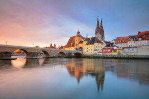 Cityscape image of Regensburg, Germany during spring sunrise.